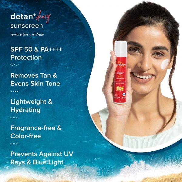 Aqualogica Detan+ Dewy Lightweight Sunscreen - 50g: A bottle of Aqualogica Detan+ Dewy Lightweight Sunscreen, 50g, featuring a sleek, white and blue design. The packaging highlights key features such as SPF 50, PA++++, fragrance-free, and color-free. Ideal for normal, dry, oily/combination, and sensitive skin, this sunscreen offers broad spectrum protection against UVA, UVB, and blue light. It contains Cherry Tomato, Hyaluronic Acid, and Zinc Oxide to hydrate, protect, and even out skin tone. Suitable for use under makeup, the product promises a non-greasy, dewy finish. Available for purchase on fiseotshirts.com for 750 tk.