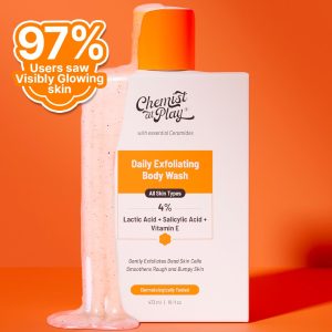 A bottle of "Chemist At Play Daily Exfoliating Body Wash" with a textured layer of the product spilling out of the bottle. The image highlights that 97% of users saw visibly glowing skin. The product is shown against an orange background.