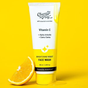 Chemist at Play 30x Vitamin C Face Wash - A tube of face wash from Chemist at Play with Vitamin C, Alpha Arbutin, and Camu Camu, placed on a light yellow background with a smear of the product behind it.