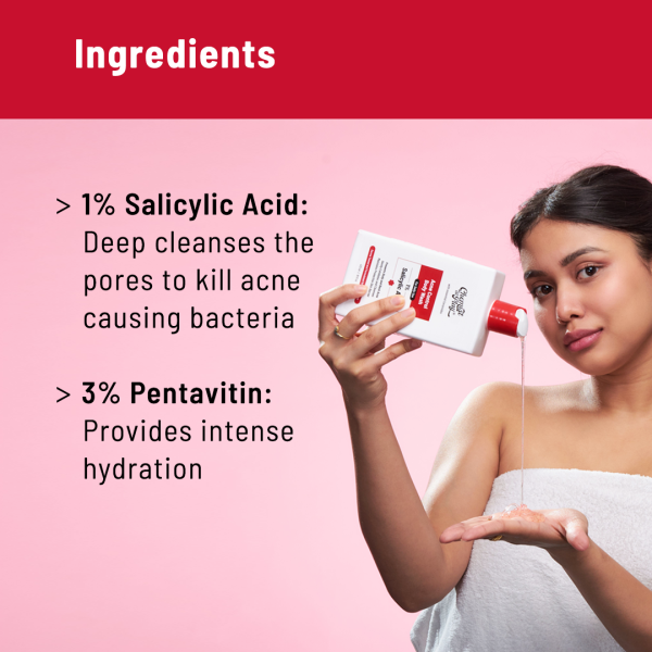 A woman pouring "Chemist At Play Acne Control Body Wash" into her hand. The text on the image lists key ingredients: 1% salicylic acid for deep cleansing and killing acne-causing bacteria, and 3% Pentavitin for intense hydration. The product is shown against a pink background.