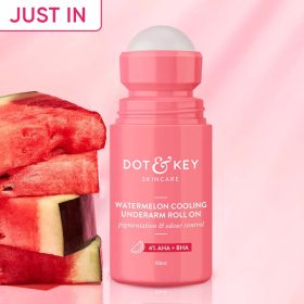 Dot & Key Watermelon Cooling Underarm Roll On - A pink bottle of Dot & Key Watermelon Cooling Underarm Roll On with a watermelon slice beside it.